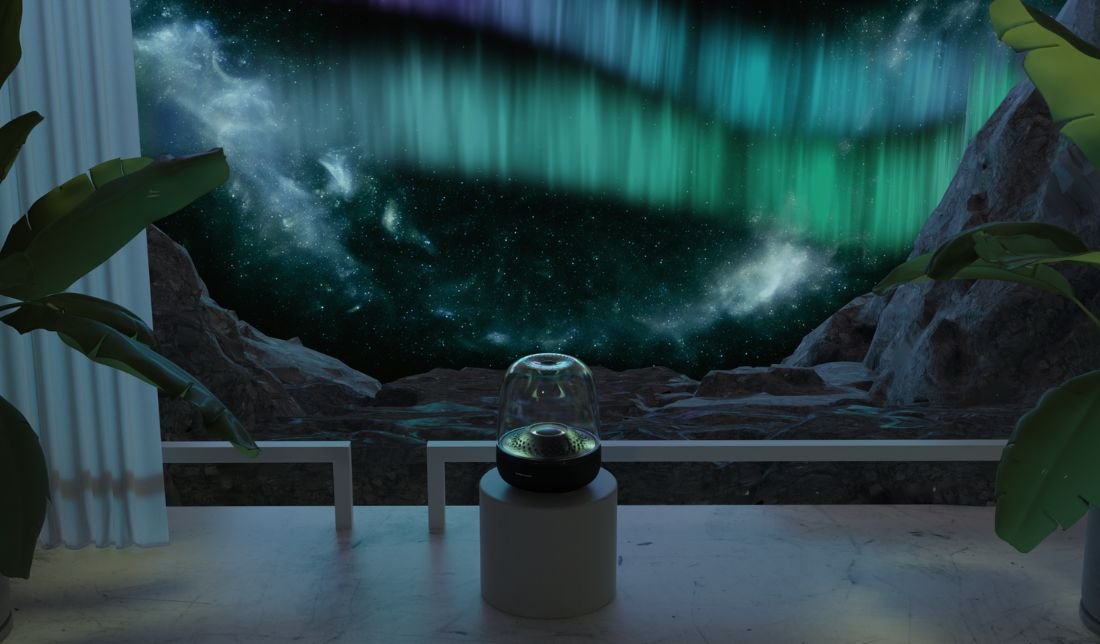 نمایشی از اسپیکر هارمن کاردن Aura Studio 4 در محیطی با نور کم